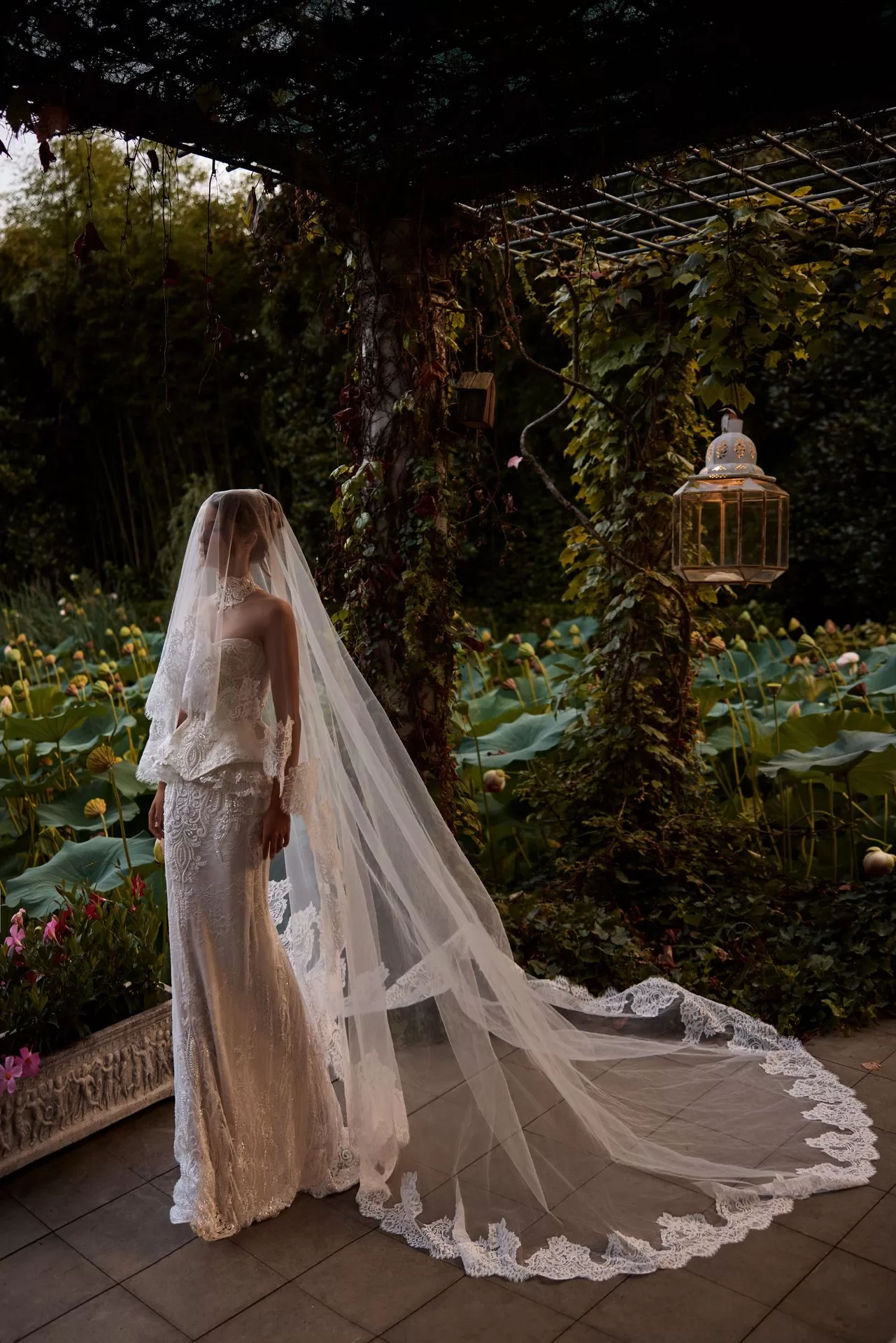 luxury 2 piece wedding gown with beaded corset and lace sheet skirt.