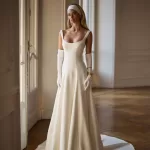 slim A-line with straps, crape wedding gown.