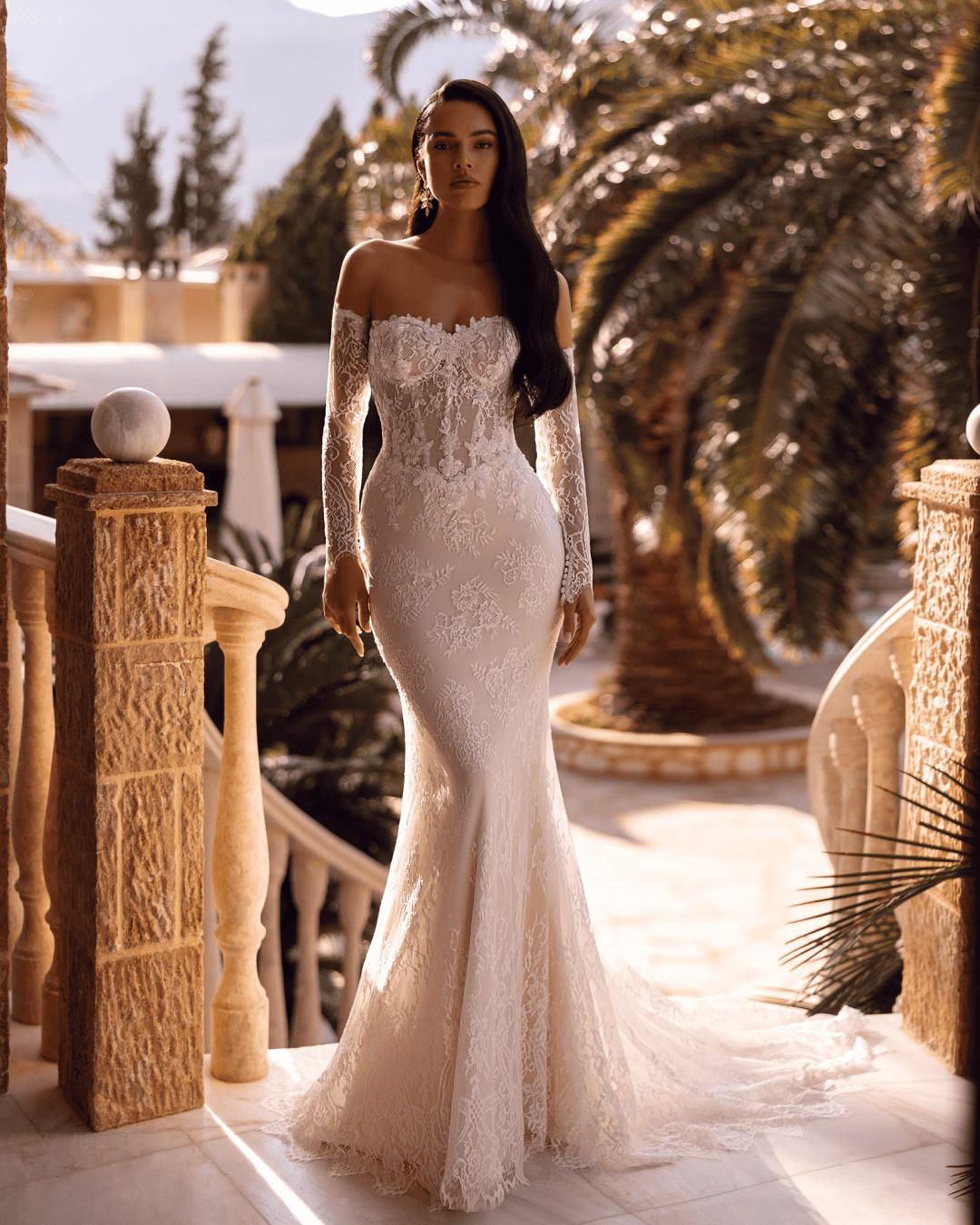Demetrios Style 8264 lace fit-and-flare wedding dress with a sweetheart neckline, illusion lace bodice, fitted silhouette, and dramatic lace train.