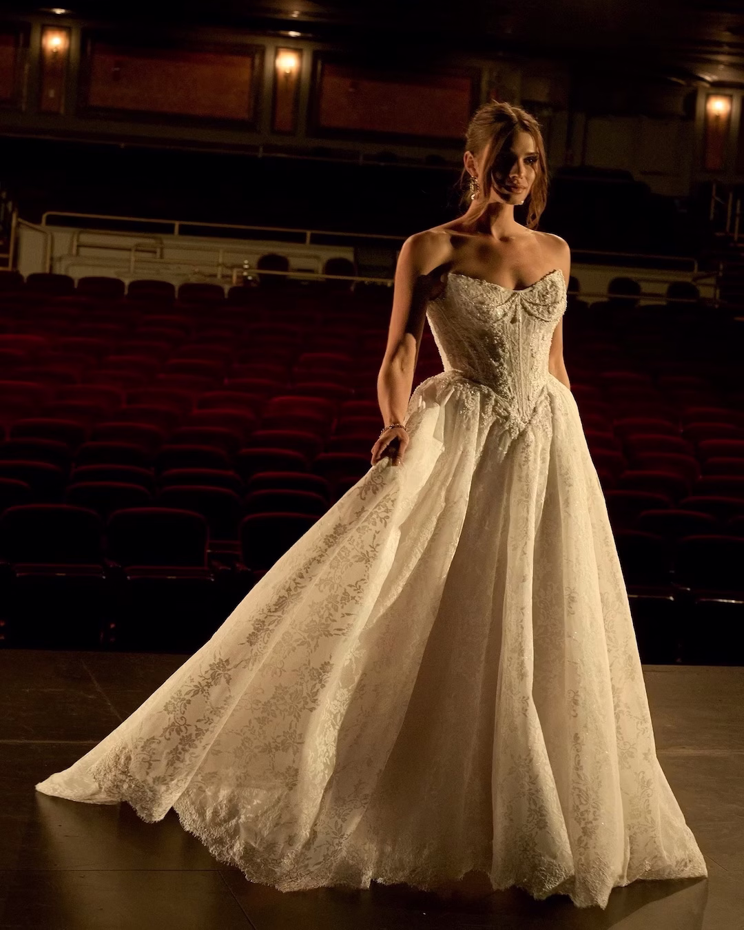 Ryland by Maggie Sottero wedding dress with pearl cat-eye neckline and Chantilly lace ball gown